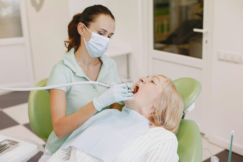 Full mouth rehabilitation restorative dentistry performed by a dentist at Yonge Wellesley Dental in Toronto