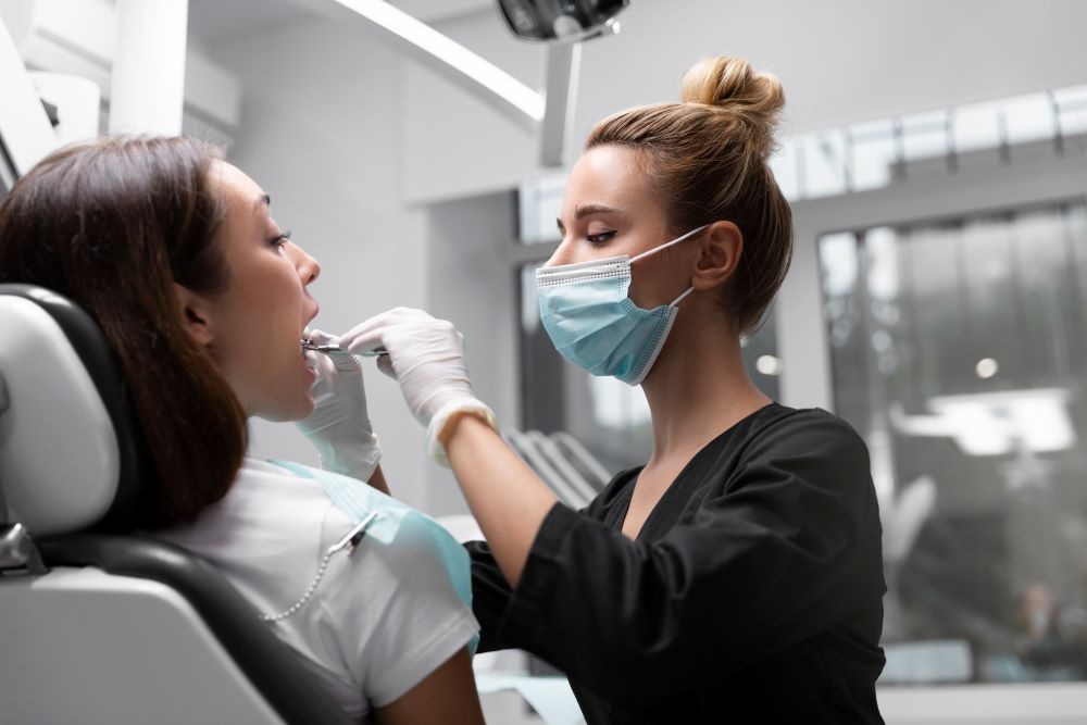 Gum disease exam and periodontal evaluation performed by a dentist at Yonge Wellesley Dental in Toronto